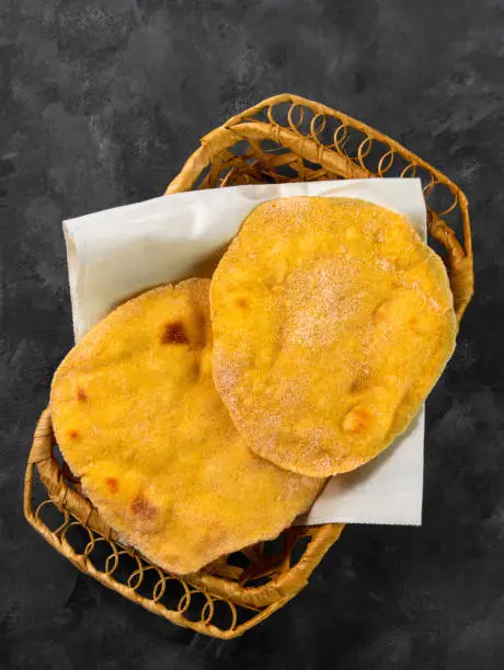 Homemade corn flatbread breadbasket gluten free meal. Handmade mexican tortilla wrapping. Traditional latin cornmeal dough bread. Authentic cuisine Fast food Taco Quesadilla cooking recipe ingredient.