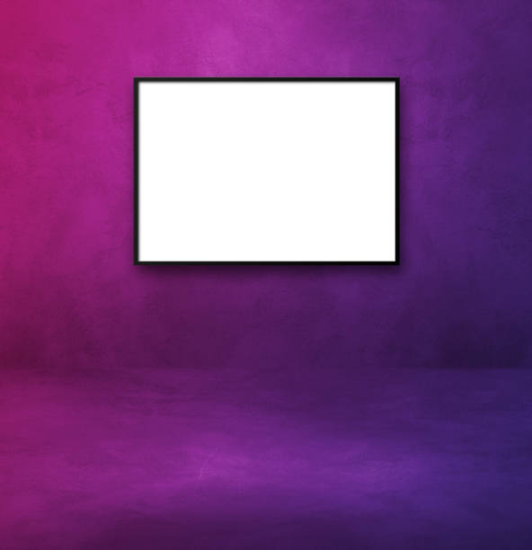istock Black picture frame hanging on a purple wall 1355233818