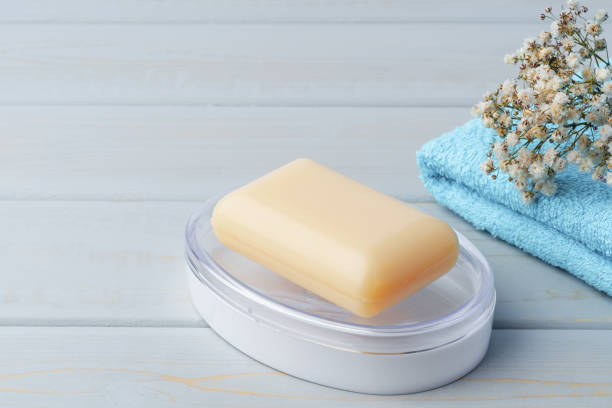 istock Soap and toiletries on shelf in blue bathroom 1355234228