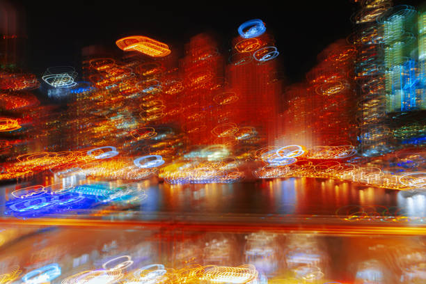 istock Blurred night city lights in Dubai city 1355235373