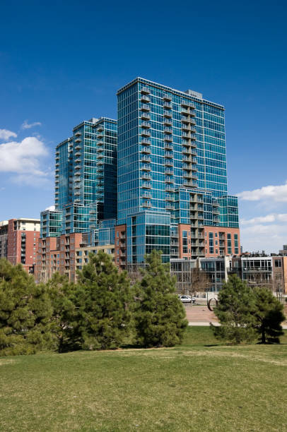 istock tall apartment building and green park 135523651
