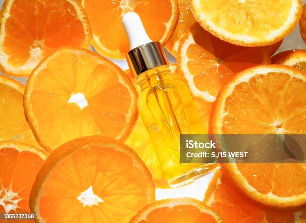 Facial Serum In A Glass Bottle With Vitamin C A Cosmetic Product With A Natural Ingredient For All Ages Top View Stock Photo - Download Image Now