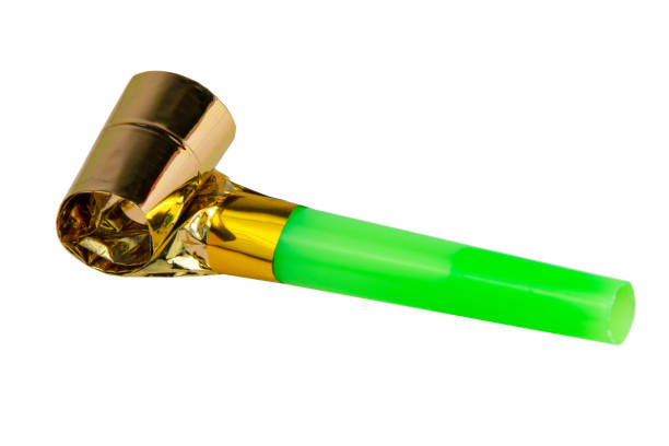 istock Party foil noisemaker whistle isolated on the white background 1355237552