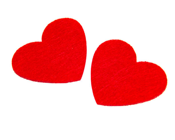 istock Red felt heart decor isolated on the white background 1355237819