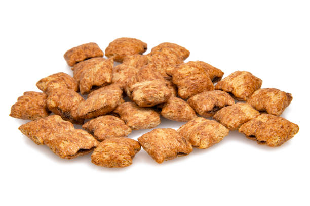 istock Chocolate cereal pillows pads isolated on the white background 1355238376