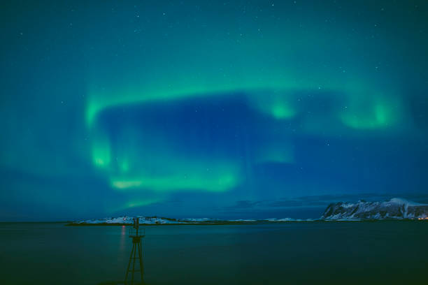 istock Aurora Northern Polar light in night sky over Northern Norway 1355238526