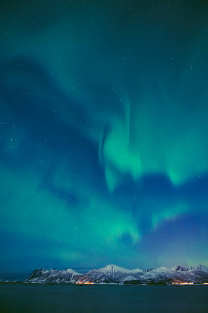 istock Aurora Northern Polar light in night sky over Northern Norway 1355238665