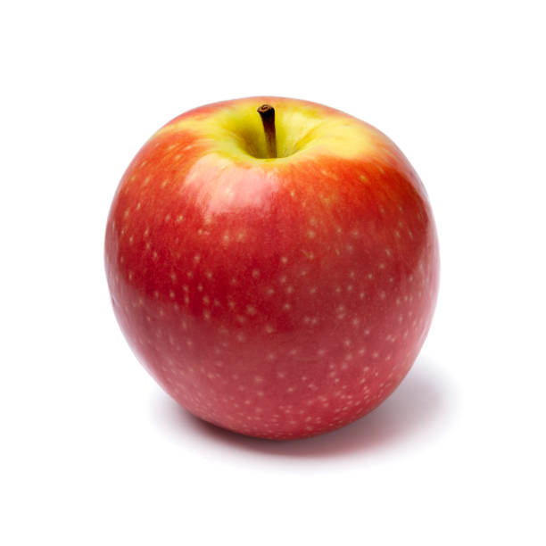 istock Single fresh healthy Pink Lady apple on white background 1355239473
