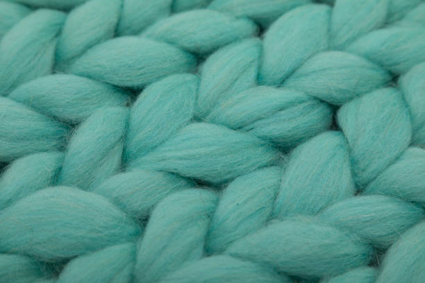 istock knitting from natural wool close-up mint color 1355240681