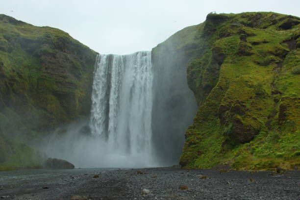 istock Waterfall Skogafoss on Iceland, Europe 1355247512