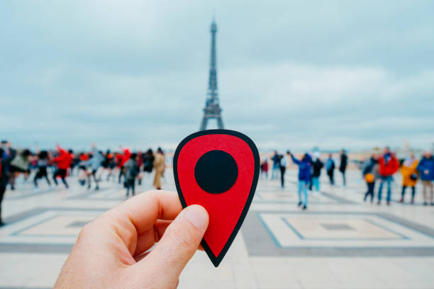 istock man with a red marker at the Eiffel Tower 1355249319