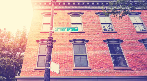 istock Old brick building with Manhattan Avenue sign, NYC. 1355249320