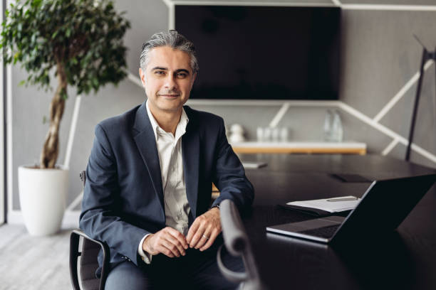 istock Portrait of Middle Eastern executive working in board room 1355250968
