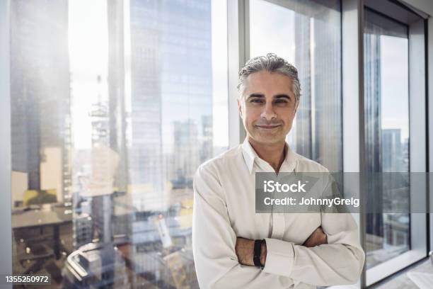 Closeup Of Smiling Middle Eastern Executive In Sunny Office Stock Photo - Download Image Now