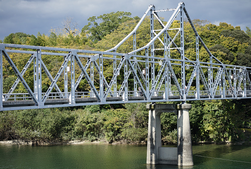 Steel structure bridge over the river.