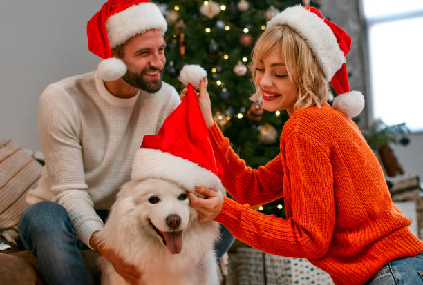 istock New Year couple and dog 1355252728