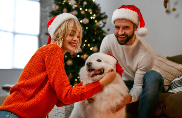 istock New Year couple and dog 1355253353