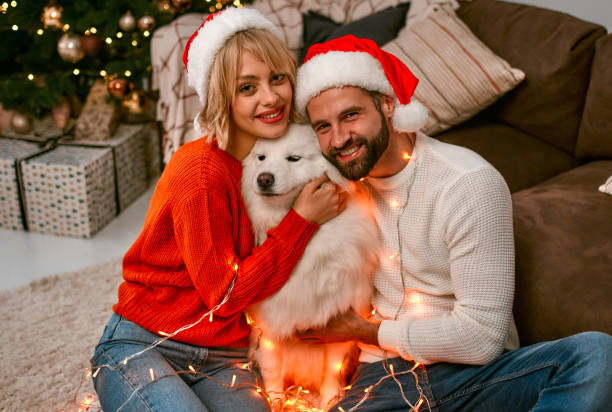 istock New Year couple and dog 1355253384