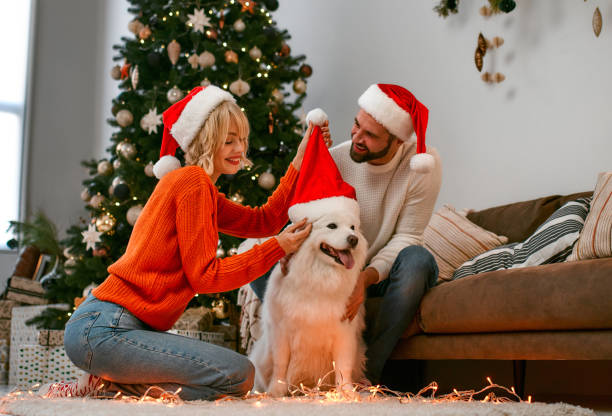 istock New Year couple and dog 1355253387