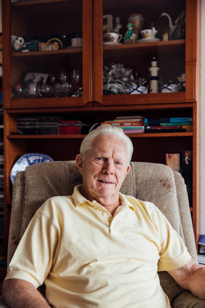 istock Senior Man Portrait at Home 1355253744