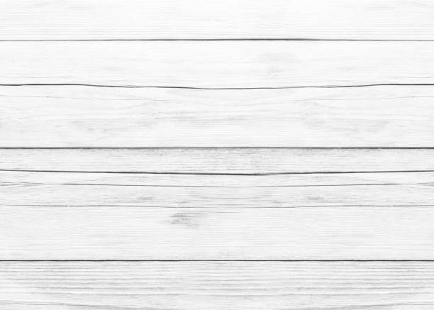 istock White grey wood color texture horizontal for background. Surface light clean of table top view. Natural patterns for design art work and interior or exterior. Grunge old white wood board wall pattern 1355253982