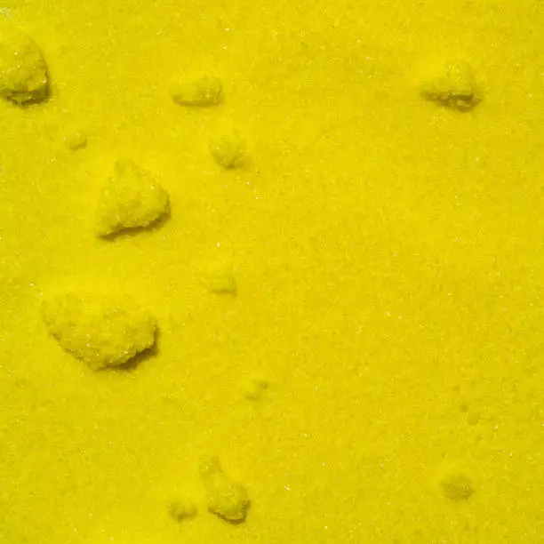 Photo of Potassium chromate, yellow solid salt of the chromate anion. A common laboratory chemical use in industrial. Science background. Top View