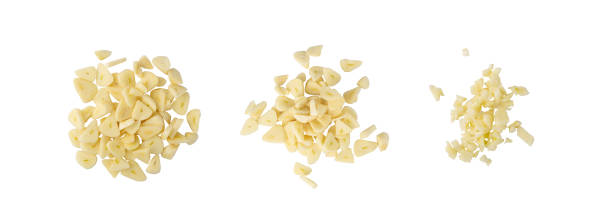 istock Fresh Garlic Parts Isolated on White Background 1355260016