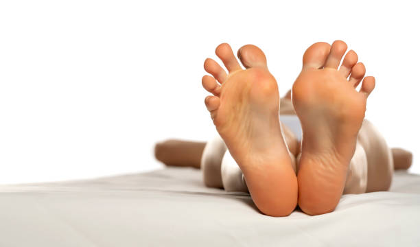 istock female soles on a white bed 1355261062