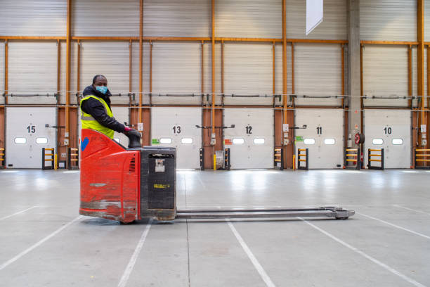 istock a wagon driver with a mask in a hangar 1355263490