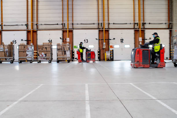 istock two wagon drivers with masks in a shed 1355264714