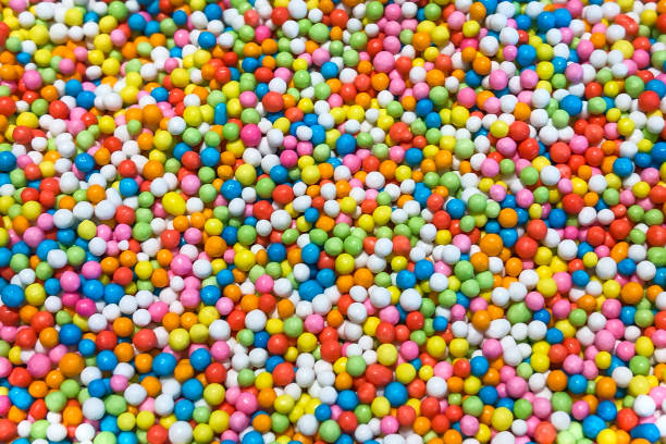 Rainbow sprinkles for topping ice cream and cake. stock photo