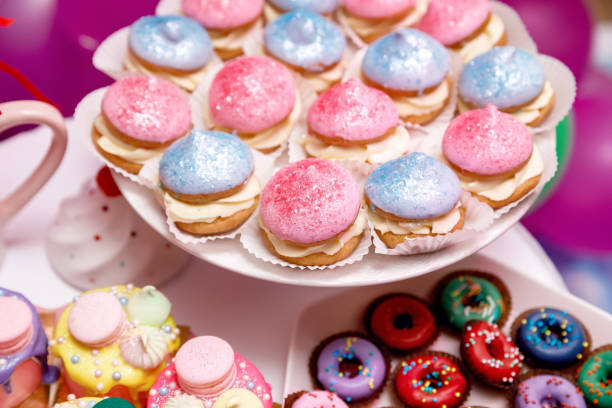 istock colorful donuts and cakes on the table 1355266620