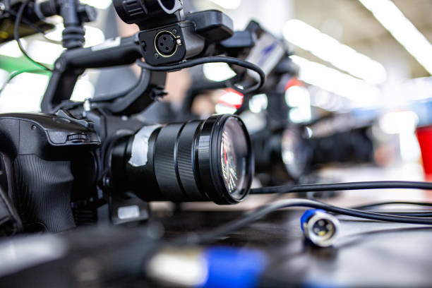 Behind the scenes of video production or video shooting. The concept of production of video content for TV, blog, shows, movies. Cameras prepared for video filming stock photo