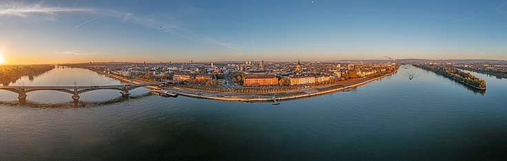 Drone panorama on the Rhine over the Theodor-Heuss bridge on the Mainz Rhine bank in the morning at sunrise