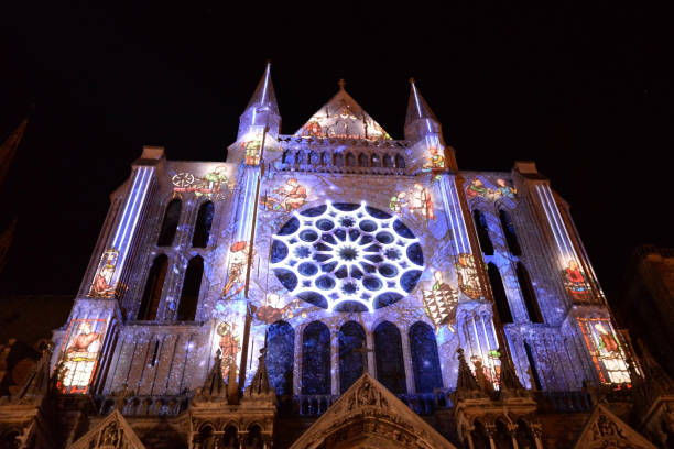 Chartres Cathedral In Lights Chartres In Lights is a free event to promote heritage through light, produced by the City of Chartres. The scenography of the royal portal of the Cathedral presents the history of Chartres. chartres cathedral stock pictures, royalty-free photos & images