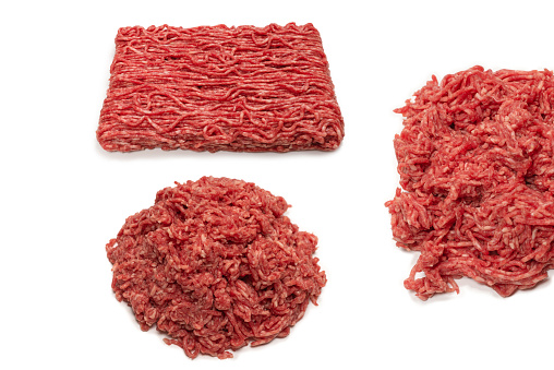 Raw beef minced meat background. Top view.