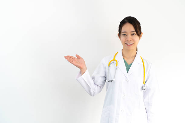 istock A young female doctor to guide you 1355277629