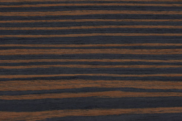 istock Black and Brown Ebony Wood Background 1355278622