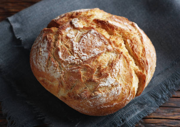 istock Small loaf of bread 1355278818