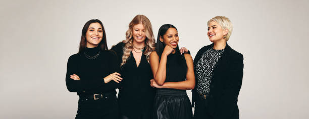 Happy group of women in a studio