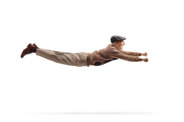 istock Elderly man flying like a superhero 1355284476