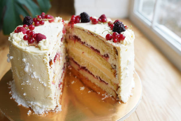 istock Tasty cake with fresh berries on table, close up 1355285903