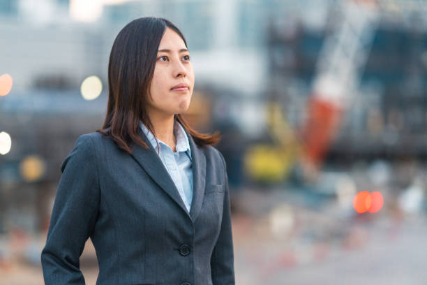 Portrait of female engineer at construction site