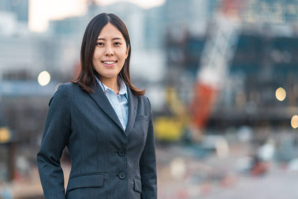istock Portrait of female engineer at construction site 1355287212