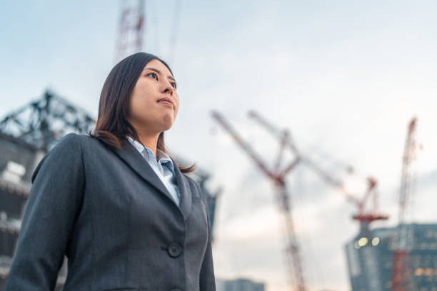 istock Portrait of female engineer at construction site 1355287441