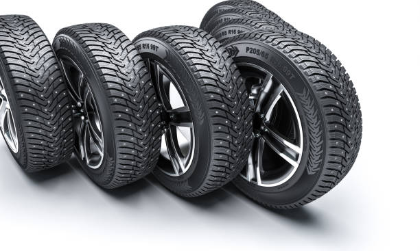 istock winter tires on the white background. 1355287466