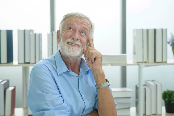istock Caucasian senior Businessman confident in modern office 1355289130