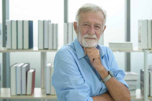 istock Caucasian senior Businessman confident in modern office 1355289193