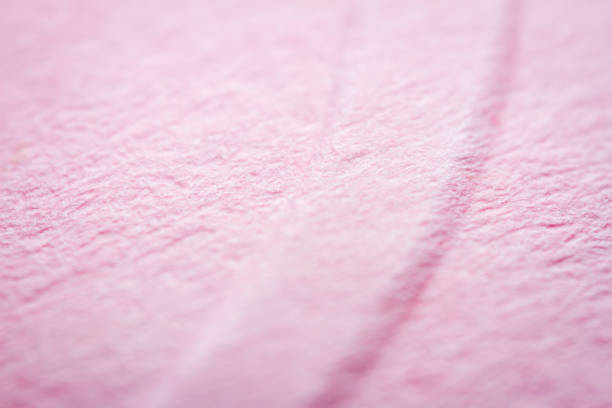 istock Extreme macro of embossed pink paper 1355290917