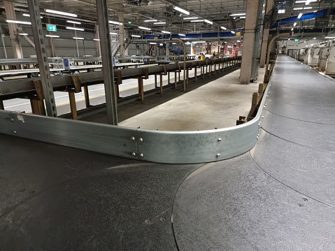 Where your bag goes behind the airport. Baggage conveyer belt